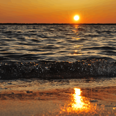 Watch the sunset on Spiaggia Libera, based just a short drive away