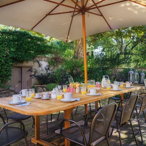 Tuck into yummy Italian cheeses and meats around your alfresco dining set