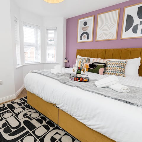 Wake to sunlight streaming in from the bay window in the main bedroom