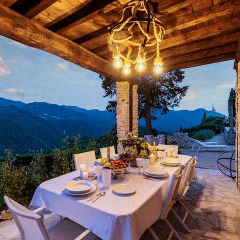 Dine alfresco on the outdoor table under the pergola