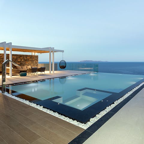 Take in the sea views from the heated salt-water infinity pool – there's a Jacuzzi too