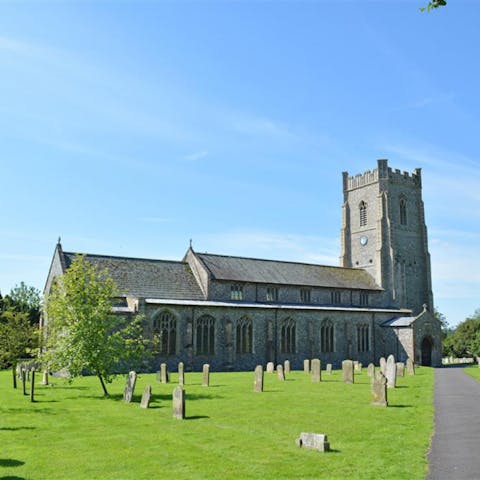 Admire the stunning 14th-century church in Castle Acre next door