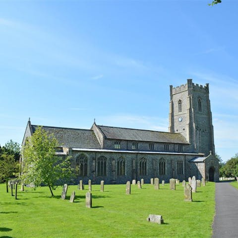 Admire the stunning 14th-century church in Castle Acre next door