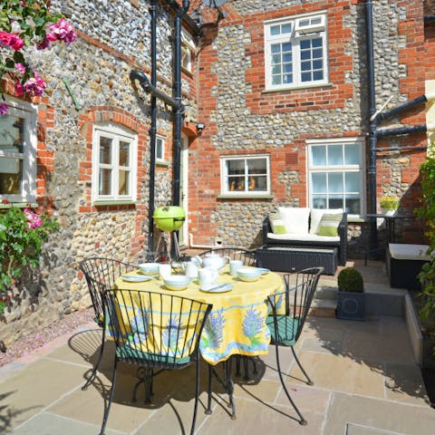 Fire up the barbecue and dine alfresco in the fully enclosed courtyard