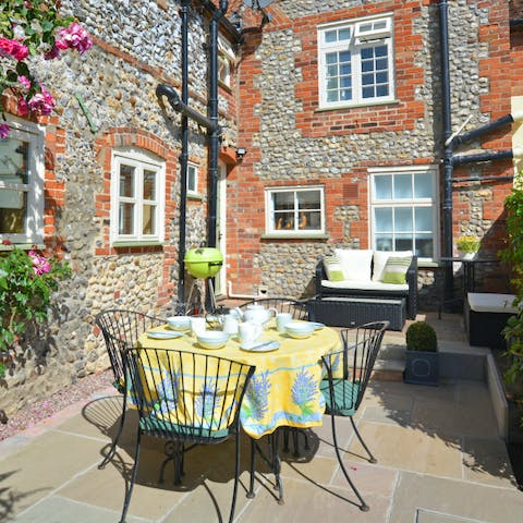 Fire up the barbecue and dine alfresco in the fully enclosed courtyard