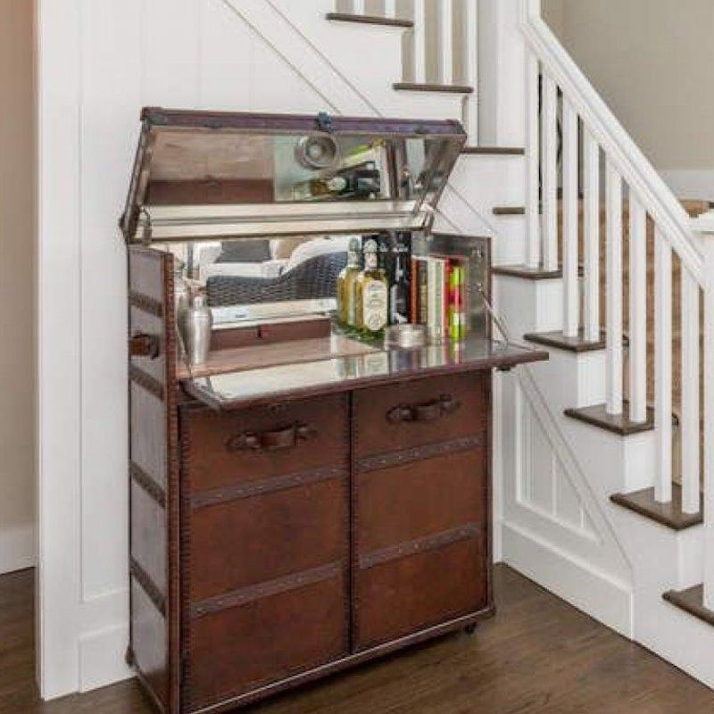 Whip yourself up a drink from the luggage-inspired bar