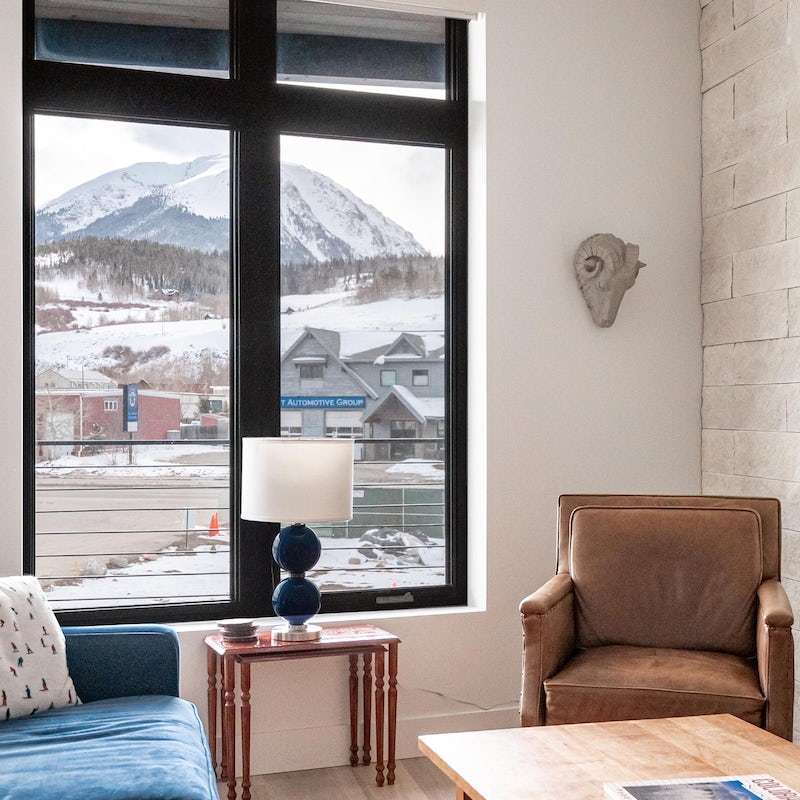 Look out across snowy peaks from the warmth of your homely living space