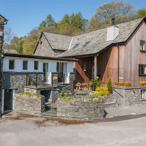 Indulge in views over Elterwater Common as you sip your favourite drink on the private patio