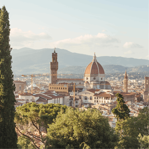 Walk or drive up to Piazzale Michelangelo and watch the sun setting over Florence