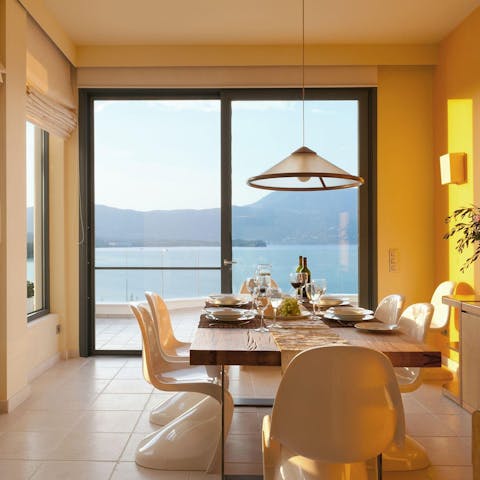 Tuck into sociable group feasts in the stylish dining area overlooking the sea