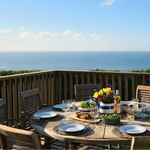 Enjoy sociable suppers on the balcony overlooking the Mawgan Porth