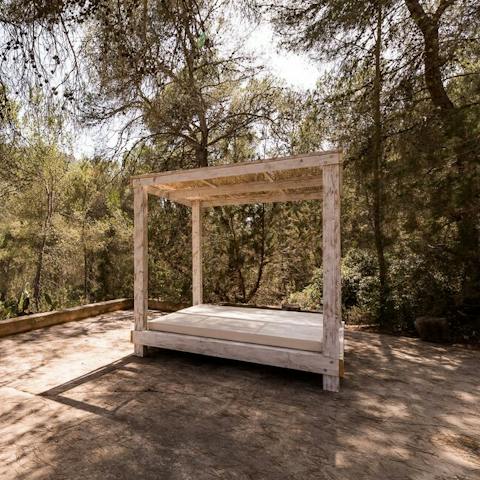 Drift off with an afternoon nap on the daybed