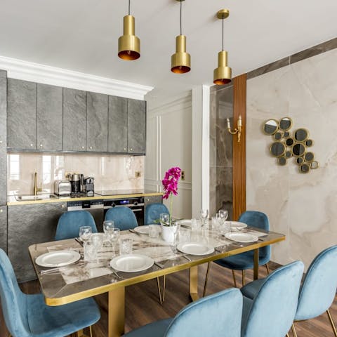 Start the day with croissants and coffee at the stylish dining table