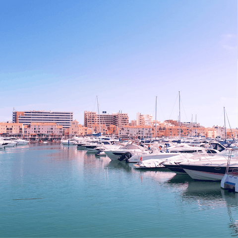 Take a sunset stroll around Vilamoura’s chi-chi marina, just a short drive away