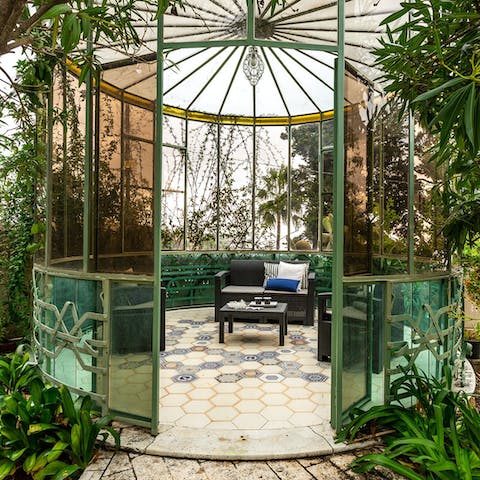 Hide away in the gazebo with a book