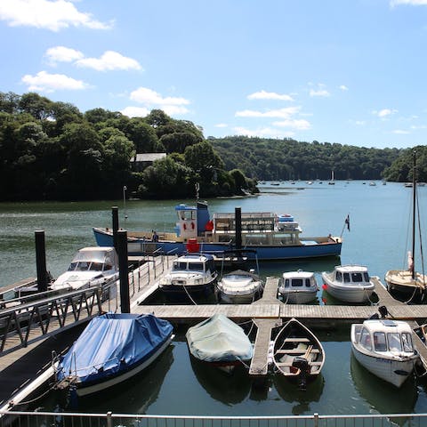Rent a boat and spend a day bobbing along the River Fal