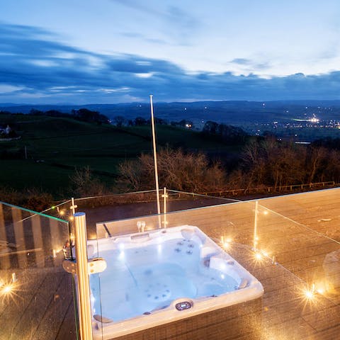 Enjoy the countryside view from the comfort of the hot tub