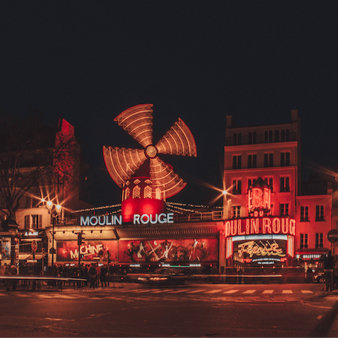 Watch a cabaret performance at the world famous Moulin Rouge, a ten-minute walk away