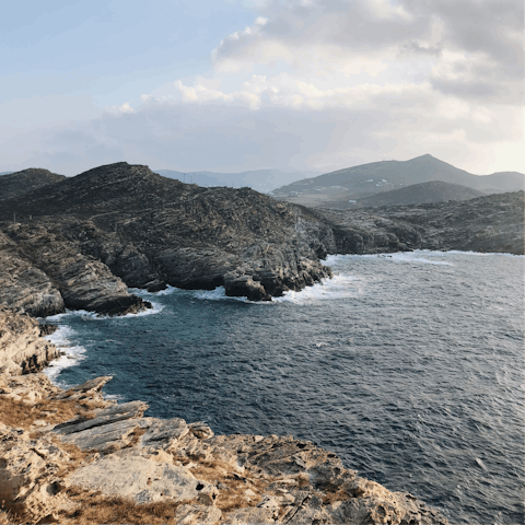 Plan a road trip to explore the rugged coastline of Paros