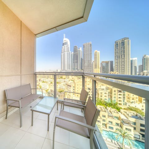 Enjoy city views over your morning coffee on the private balcony