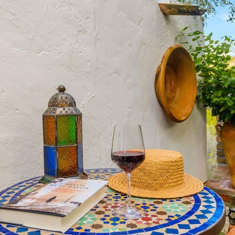 Sip on a glass of wine whilst reading your favourite book