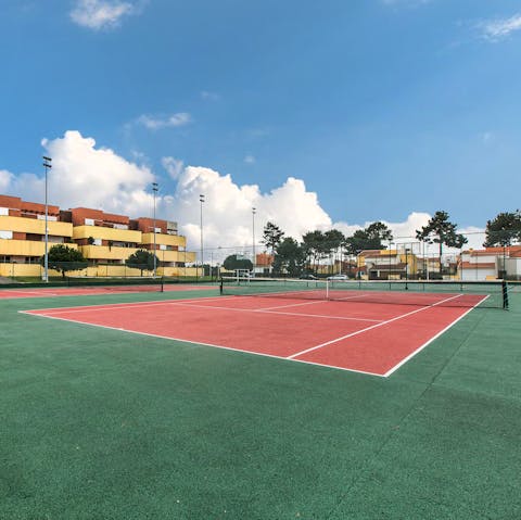 Practise your drop shot on the shared tennis court