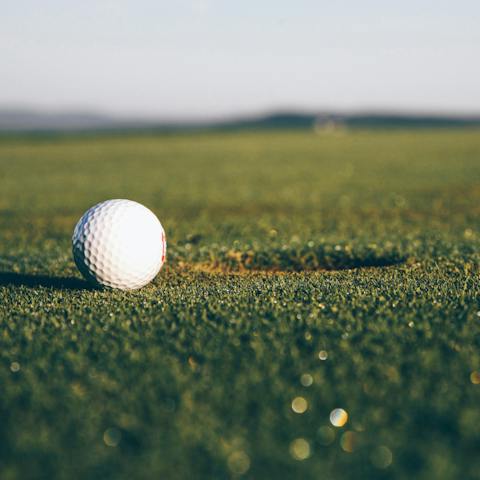 Enjoy a round of golf, with the nearest course a mere five-minute drive away