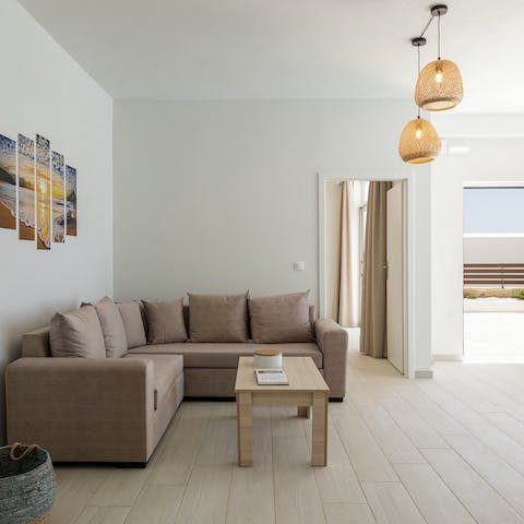 Take a repose from the sun and stretch out on the sofa with your new book