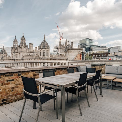 Admire views across the city from the private terrace 