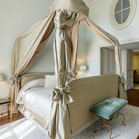 Enjoy a sleep fit for a king's mistress in the classic four-poster bed