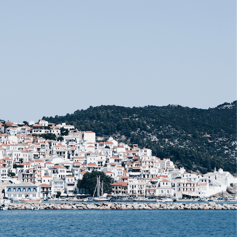 Take in views over Skopelos from your coastal location, a kilometre outside of town
