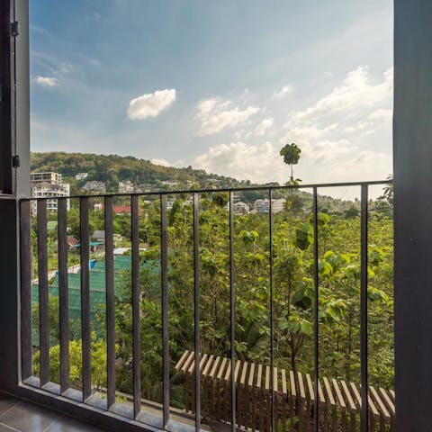 Soak up stunning views of Choeng Thale from your private balcony