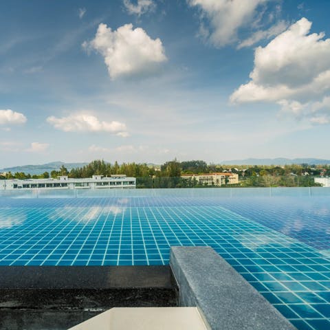 Beat the Thai heat with a refreshing dip in the rooftop infinity pool