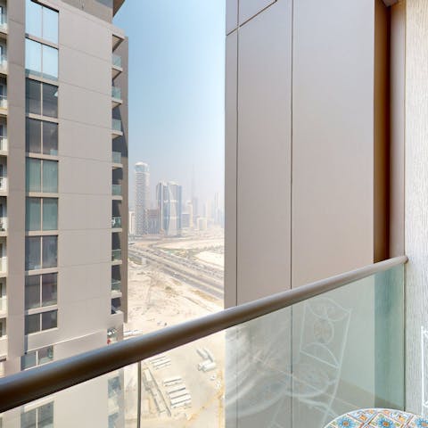 Take in the glimpses of the Downtown Dubai skyline from the private balcony