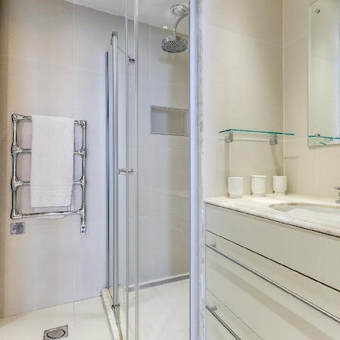 Enjoy the ample walk-in rainfall shower after a long day exploring