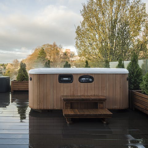 Unwind with a glass of bubbly and a soak in the hot tub