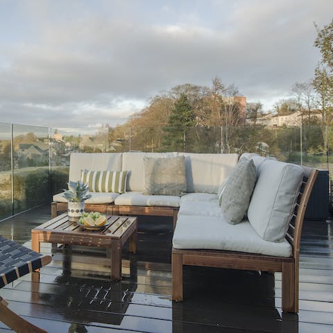 Share a bottle of wine on the private roof terrace overlooking the River Tay