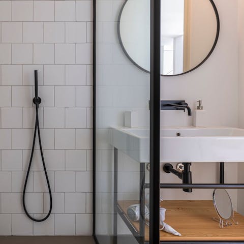 Get ready in the stylish, monochrome bathroom for a night out in Lisbon