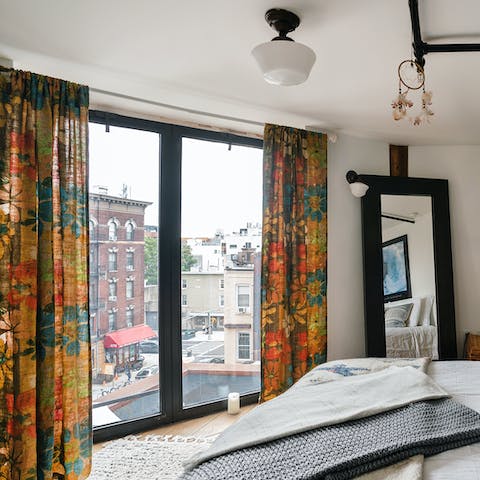Wake up to floor-to-ceiling views of the city