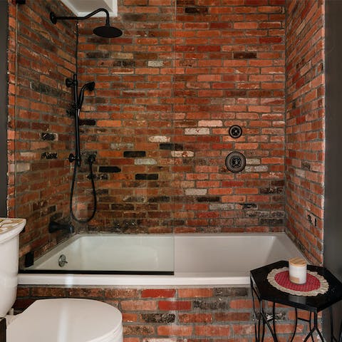 Treat yourself to a soak in the brick-framed tub after a day of sightseeing