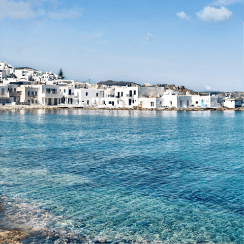 Discover the charming fishing village of Naousa, a short drive away