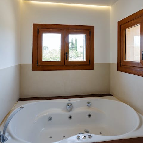 Treat yourself to a long soak in the Jacuzzi tub