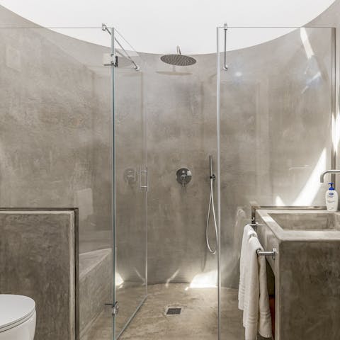 Wash off the sand in one of the home's stylish bathrooms