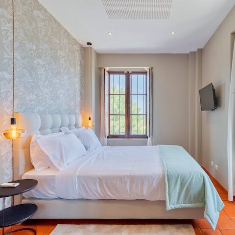 Wake up to leafy views, rested and ready for another day of coastal fun