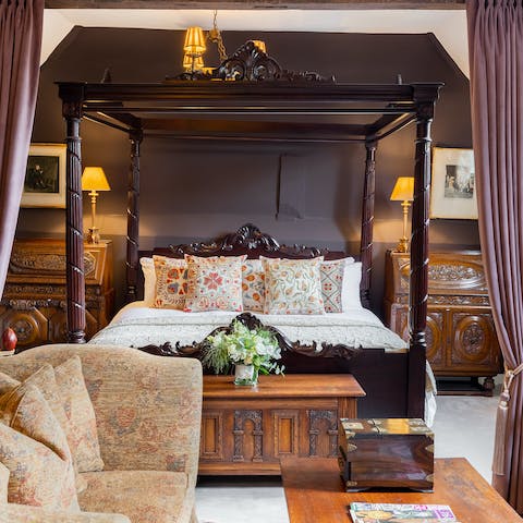 Drift off to sleep in the beautiful hand-carved bed