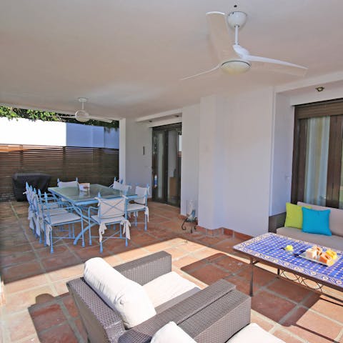 Light the barbecue and dine alfresco in the shade of your covered terrace