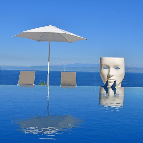 Swim in the stunning infinity pool to soak in the stunning views