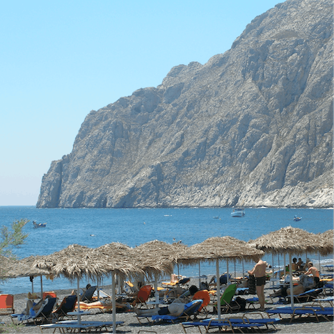 Take the short drive to Kamari Beach and relax in the sunshine