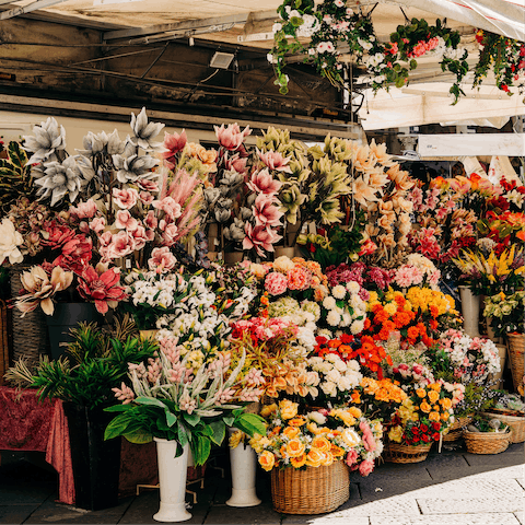 Soak up the colourful atmosphere of Columbia Road Flower Market, a twelve-minute walk away