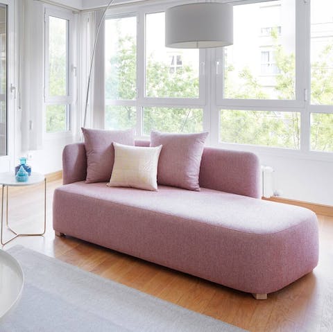 Grab your book and get comfy on the pink chaise lounge